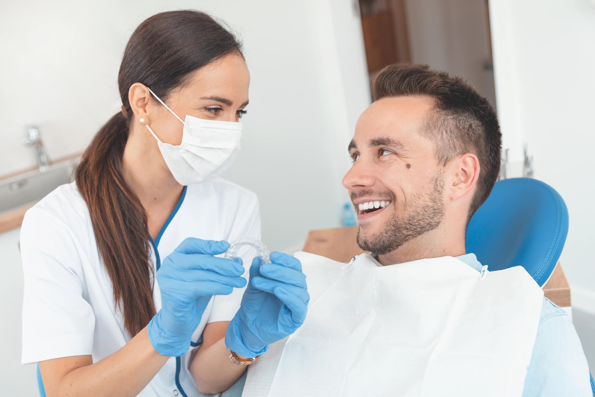 dentist showing patient invisalign citrus county
