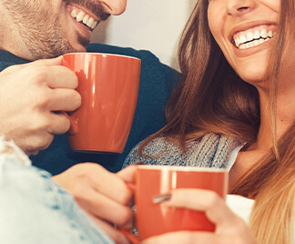 man and woman with coffee