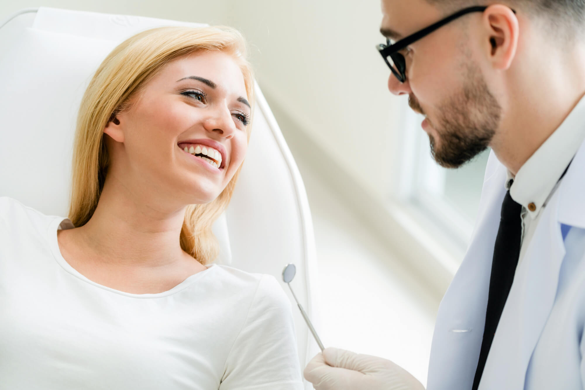 woman consulting with a restorative dentist crystal river fl